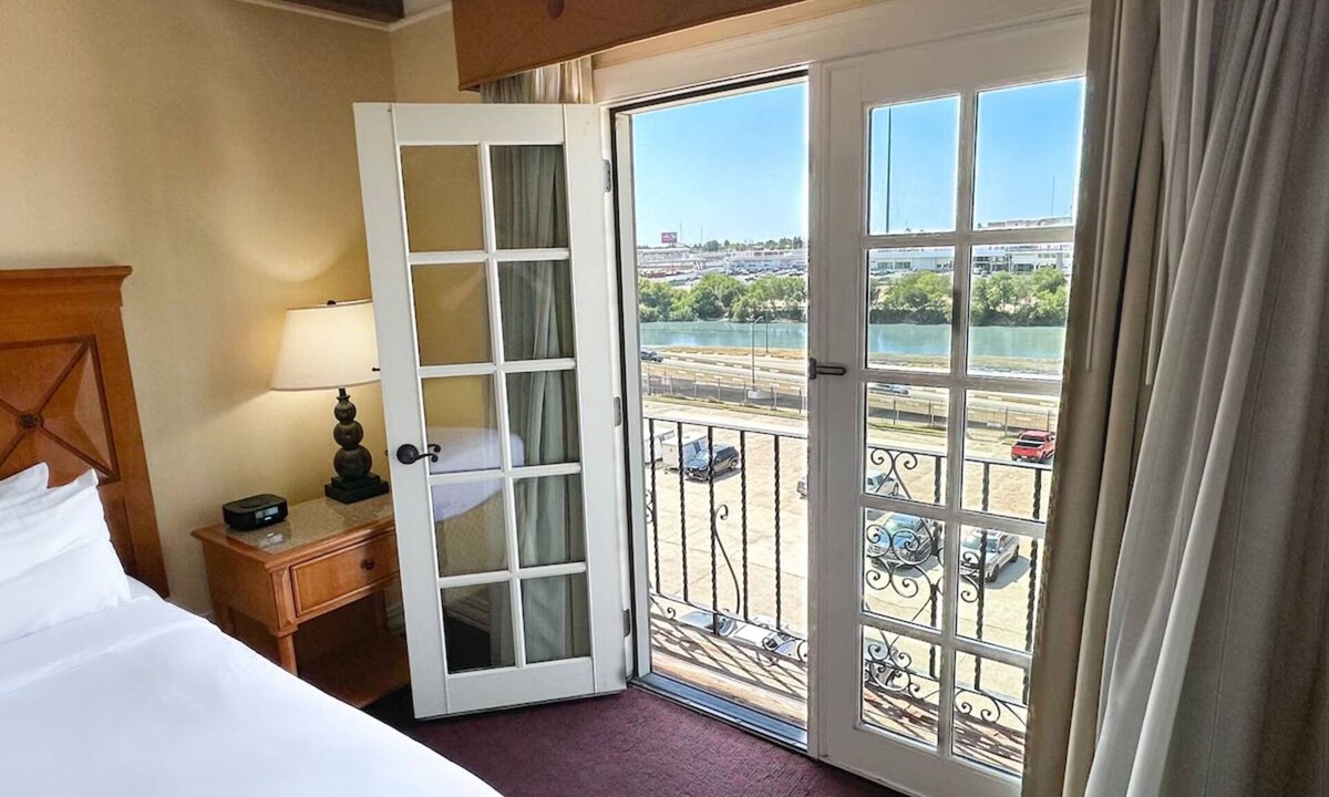 Western Division Hotel | Downtown Laredo Stay with Two Pools, Airport Shuttle, Grill & Hot Tub