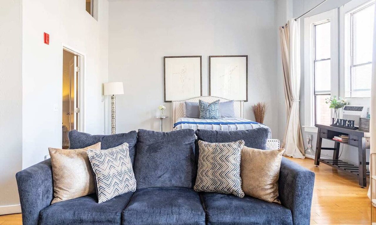 Gaslamp Quarter Hotel | Spacious 1 BR 700 sq ft loft suite with free parking, steps to the Convention Center and Gaslamp dining. Ideal for business or group travel.