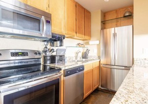 Located near the Village and can sleep a crowd! Year round hot tub near condo