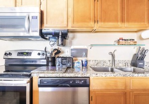Located near the Village and can sleep a crowd! Year round hot tub near condo