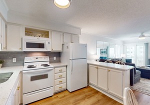 Second-Floor Condo with Ocean & Courtyard View, Balcony, WiFi, Shared Pool