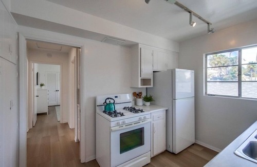 Beach Barber Tract Condo | 2 Dog Friendly Units + 2 Garages + Ocean 1 Block