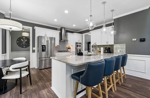 Mayhew House | 3 Story Waterfront Brick Home w Brand New Pool/Spa, foosball, ping pong and much more