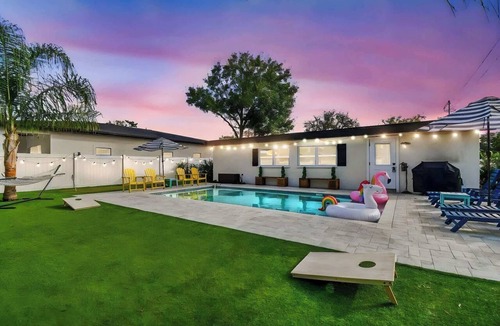 Sun Bay South House | Backyard Paradise: Private Pool, Golf & Fire Pit
