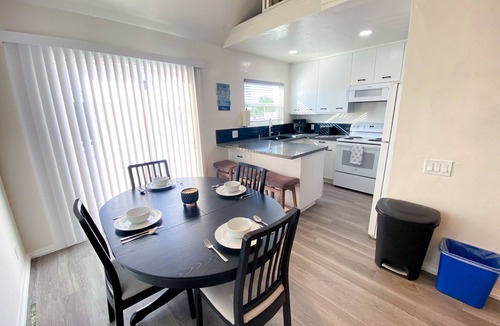 Crown Point House | Bay View Condo 1/2 block to Beach Park-Spa and Private Patio-Dog Friendly