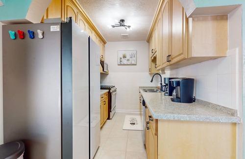 East Daytona House | Colorful charmer with ocean views, deck, & dog-friendly yard - snowbird-friendly