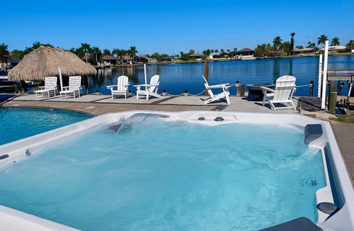 Eight Lakes Villa | Dolphin Cove Villa Gulf Access Waterfront Heated Pool & Hot Tub Game Room