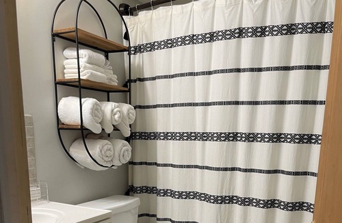 Prudenville Cottage | Freshly renovated cottage, steps from the lake or a quick ride to the trailhead!