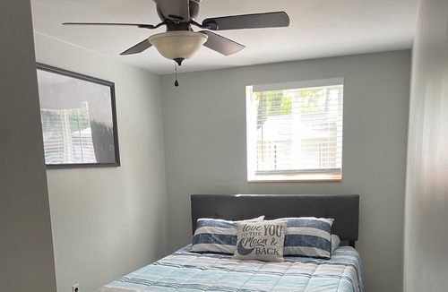 Prudenville Cottage | Freshly renovated cottage, steps from the lake or a quick ride to the trailhead!