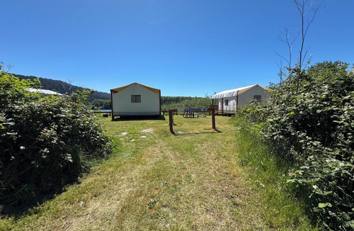 Klamath RV Rental | Glamping tent on the river.