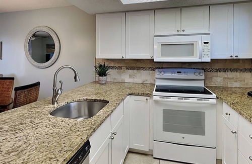 Butler Beach Condo | Ground-Floor Condo with Patio, Community Pool and Direct Beach Access.