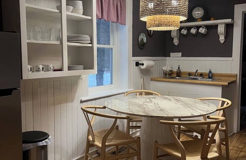 Laurium Cottage | NORTHERN LIGHTS! Historic Storybook Beach Cottage at Tamarack Waterworks
