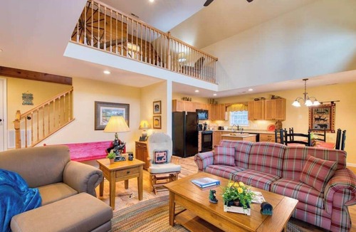 Lake Junaluska House | Open and modern upper-level space with WiFi, central AC, pool, wraparound deck