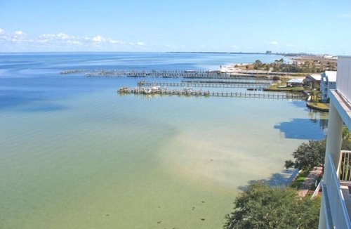 Fort Walton Beach Condo | Penthouse-Directly ON Water-Huge Roof Top Patio-Private Hot Tub-Gorgeous Views!