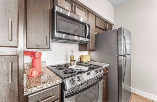 Greater South River City Apartment | Prime SoCo 2BR King Suite w/GymPickleballLaundry