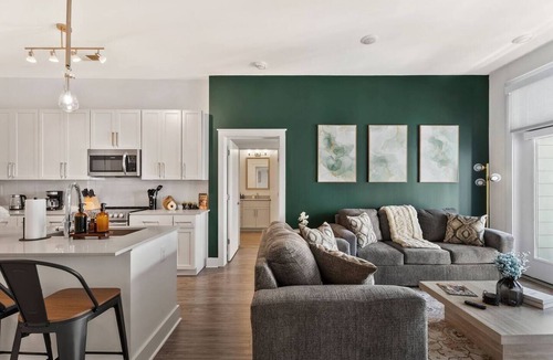 Second Ward Apartment | Queen City Haven - Free Parking, Pool, Balcony