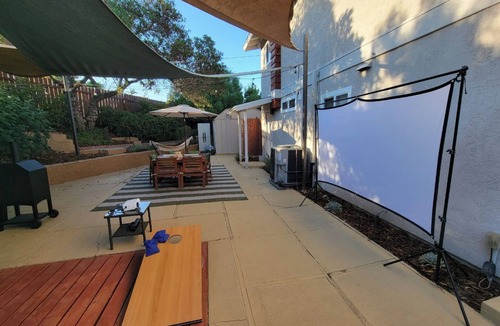 North Park Villa | San Diego's 4-bed Oasis with Hot Tub, Gym, Outdoor Theater & Huge Yard.