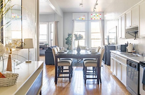 Gaslamp Quarter Hotel | Spacious 1 BR 700 sq ft loft suite with free parking, steps to the Convention Center and Gaslamp dining. Ideal for business or group travel.