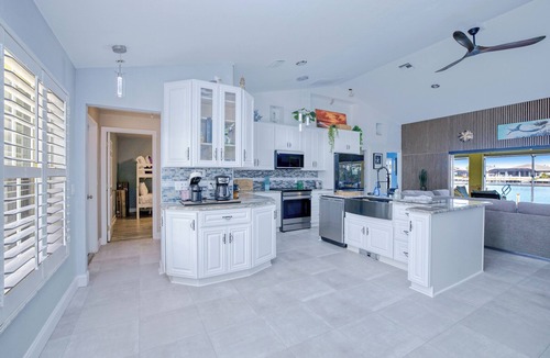 Burnt Store House | Summer discount! Family Oasis-Heated pool and hot tub. Wide canal & manatees