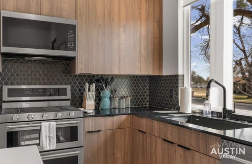 Central East Austin House | Swim, Sing & Stay | Modern Home w Heated Pool & Karaoke | Mins from Rainey & 6th