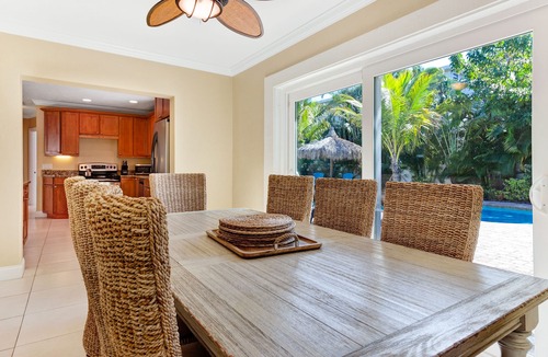 Holmes Beach House | Tropical-themed getaway w/heated private pool - walk to free trolley, shopping