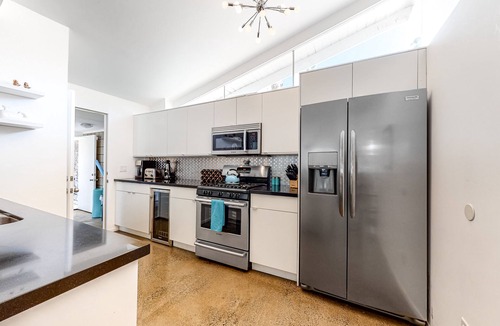 Twin Palms House | Vibrant home with private pool with spa, firepit, and private gas grill