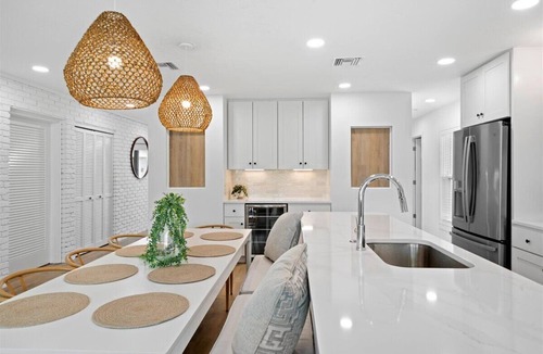 Cocoa Isles House | Walk to beach, riverfront, pool home. Bring your boat!