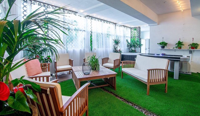 Artfully arranged, open and inviting 2 bedroom suite with a private yard.
