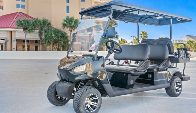 Beautiful Condo* On Beach* Golf Cart* Tropical Pool*Tiki Bar*Hot Tub*Kiddie Pool