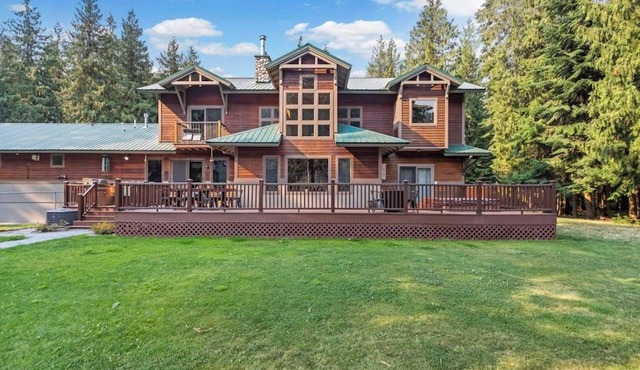 Expansive Riverfront Lodge with Dock, Game Room, Bar & Spacious Deck!
