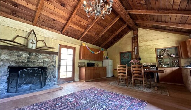 FRENCH 1914 STONE CABIN w/clawfoot bathtub, fireplace + private trails & creek