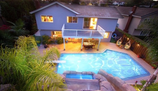 Spacious 6 Bedroom Vacation Home with Waterslide & Heated Saltwater Pool