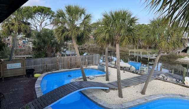 St. George Island Waterfront Apt., Dock, Giant Saltwater Pool, & Fire Pit