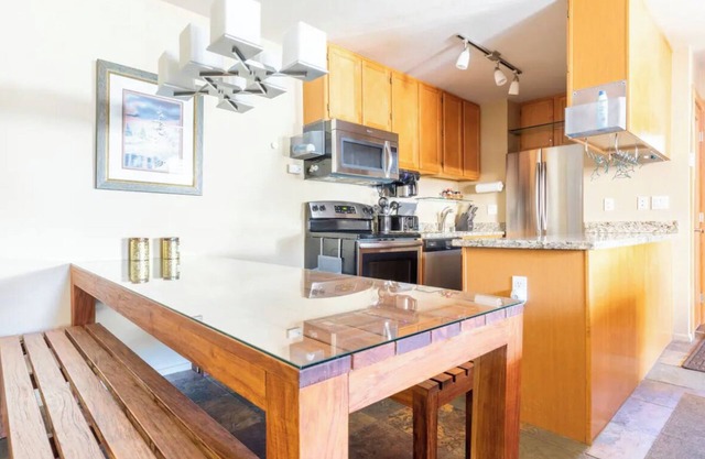 Located near the Village and can sleep a crowd! Year round hot tub near condo